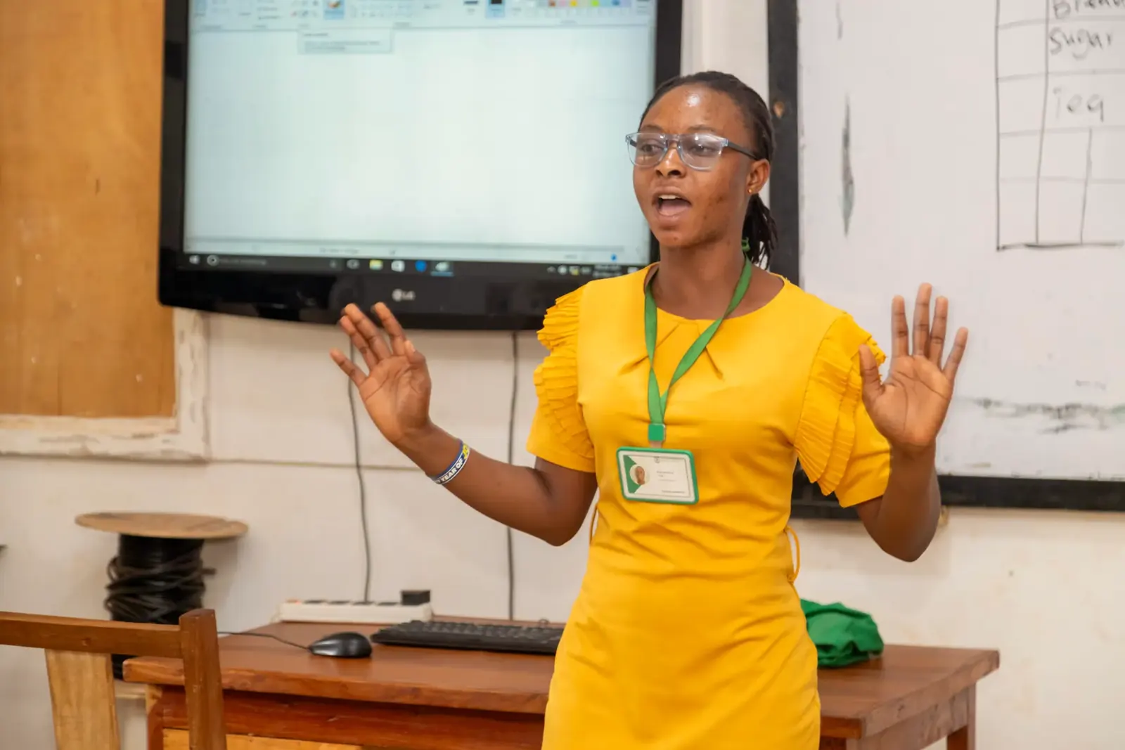 A teacher leading a lesson in the ICT lab