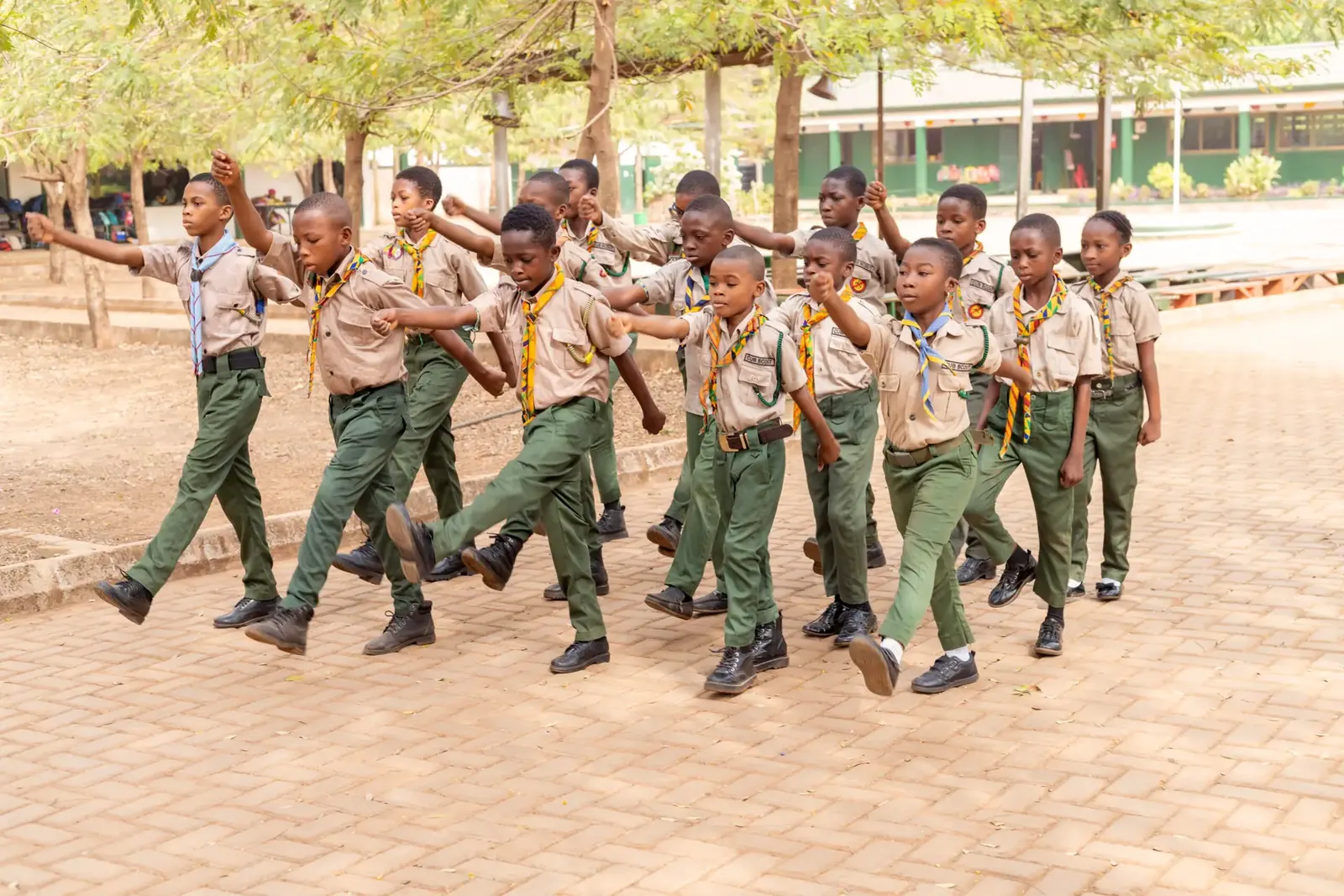 OARS scouts marching across the compound